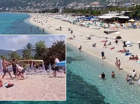 Alanya’da plajda İngiliz turiste şezlong dayağı! Skandal görüntünün bedeli ağır oldu