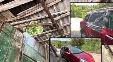 Garaj çatısına çıkan kurbanlık boğa, otomobilin üzerine düştü