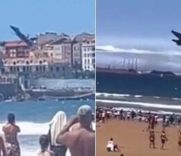 Gösteri az kalsın faciayla bitecekti: Savaş uçağı plajdakilerin üstünden teğet geçti!