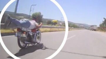 Motosikletin üzerine yattı, cezası kameralardan geldi
