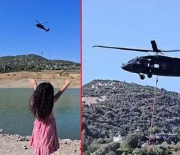 Skorsky tipi askeri helikopteri görünce elini kaldırdı! Küçük kıza unutulmaz anı