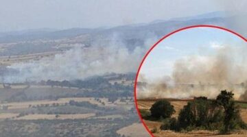 Çanakkale’de tarım arazisinde çıkan yangın rüzgarın etkisiyle büyüdü