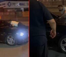 Kıskançlık kabusu! Nişanlısının içinde bulunduğu aracın kaputuna yattı: Arabadan in