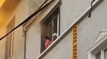 Alevlerden kurtulmak için önce torununu sonra kendini aşağı attı